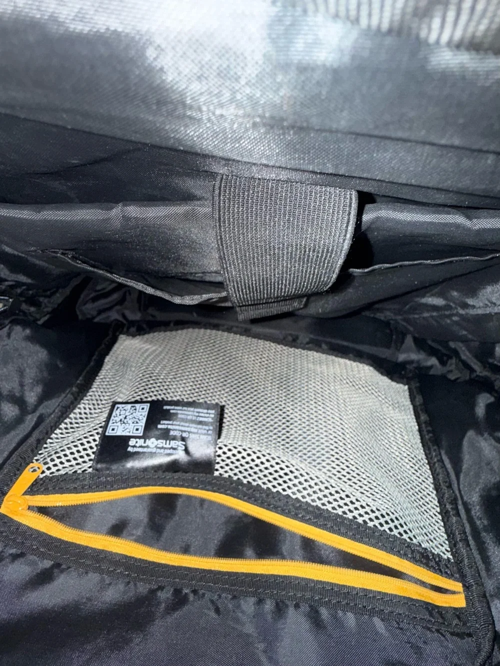 Samsonite Gray Backpack with Black Accents and Gold Zippers